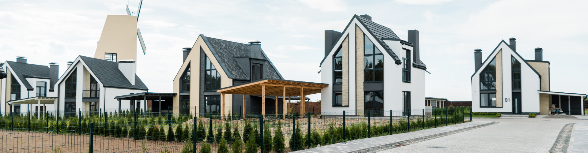 Modern residential complex with newly built double-storey homes in a secure estate